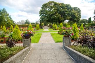 A new accessible cement pathway leads into the sunken garden.