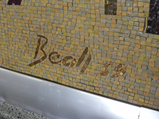 Mural highlight number three shows Ms. Beall's signature and the year '59 made from pieces of cut glass and stone.
