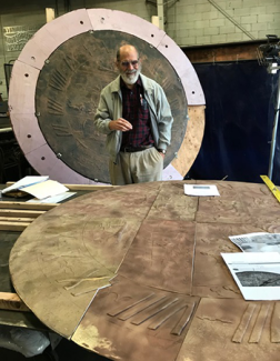 Woody Sullivan, an astronomy professor at the University of Washington, surveys the repair work on the sundial