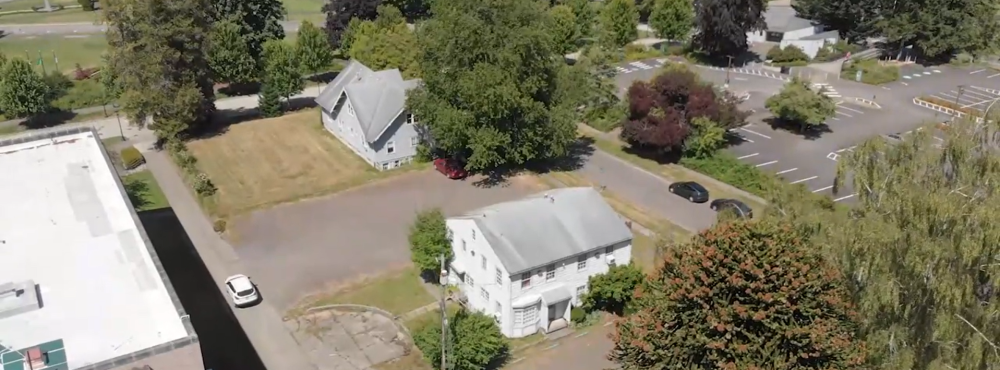 An aerial photo of two Capitol Press Houses: Ayer House, also known as the White House, and Carlyon House.