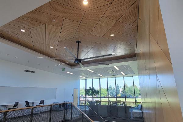 A public works project that has a beautiful geometric wood space in the ceiling