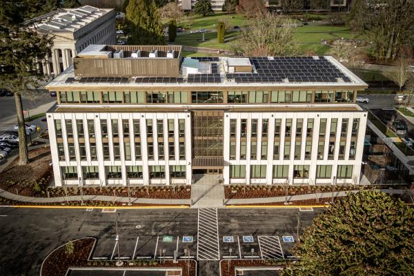 An aerial view of the south side of the Newhouse Building. Parts of the West Campus lawn and the Insurance Building are visible in the background. Photo courtesy of TVW.